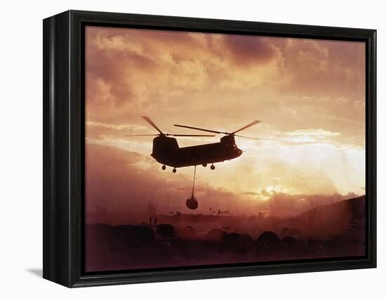 Chinook Helicopter Lifts Ammunition-null-Framed Premier Image Canvas