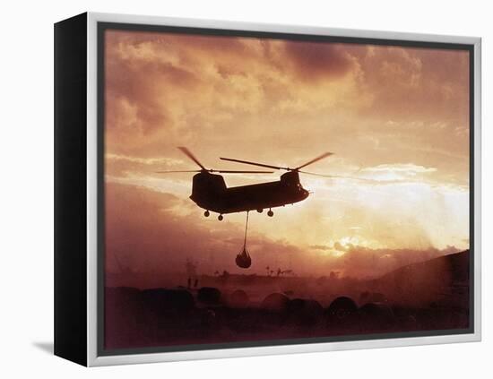 Chinook Helicopter Lifts Ammunition-null-Framed Premier Image Canvas