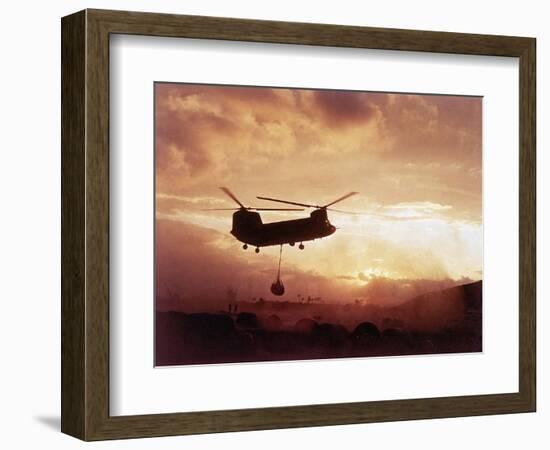 Chinook Helicopter Lifts Ammunition-null-Framed Photographic Print