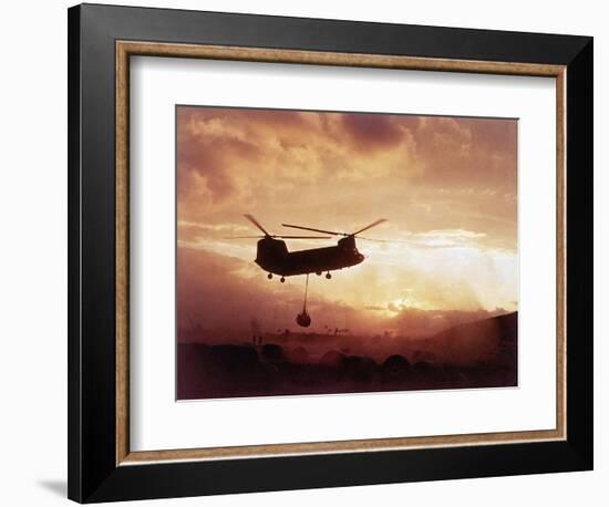 Chinook Helicopter Lifts Ammunition-null-Framed Photographic Print