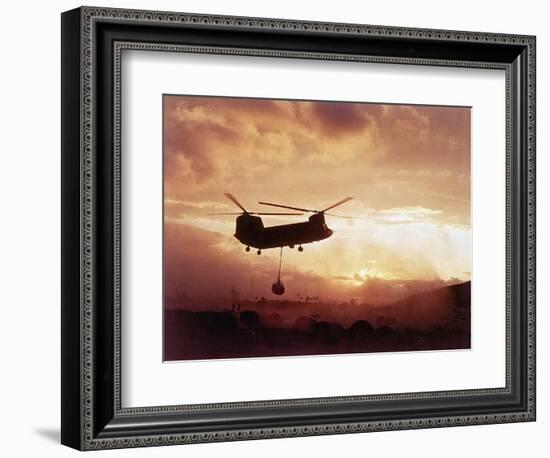 Chinook Helicopter Lifts Ammunition-null-Framed Photographic Print