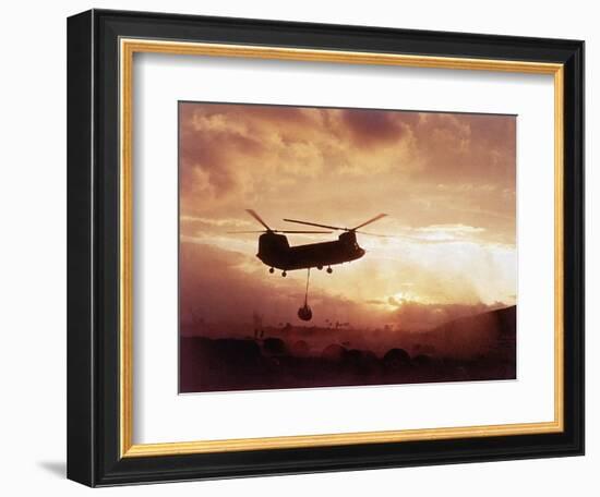 Chinook Helicopter Lifts Ammunition-null-Framed Photographic Print