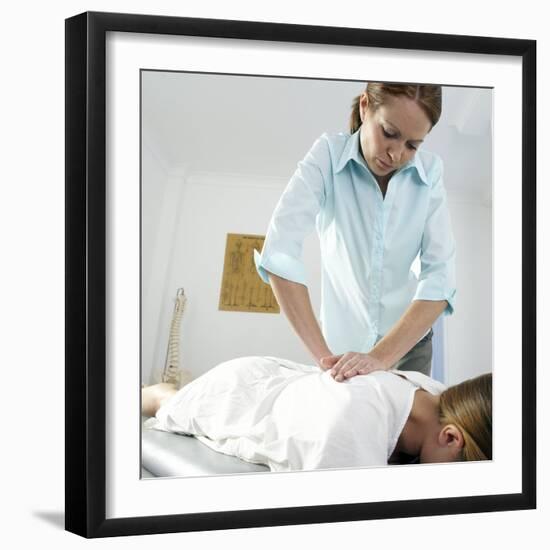 Chiropractic Treatment-Adam Gault-Framed Premium Photographic Print