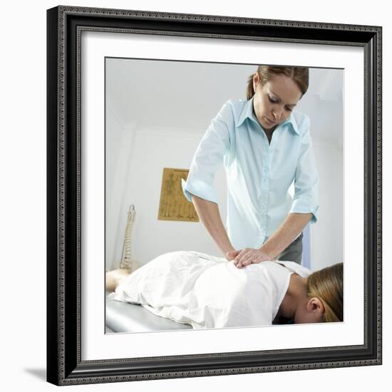 Chiropractic Treatment-Adam Gault-Framed Premium Photographic Print