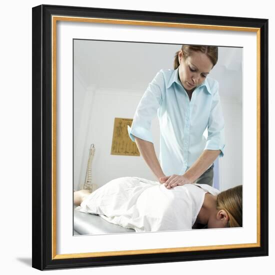 Chiropractic Treatment-Adam Gault-Framed Premium Photographic Print