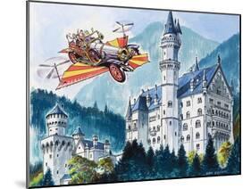 Chitty Chitty Bang Bang Passes by Neushwanstein in the Bavarian Alps-Dan Escott-Mounted Giclee Print
