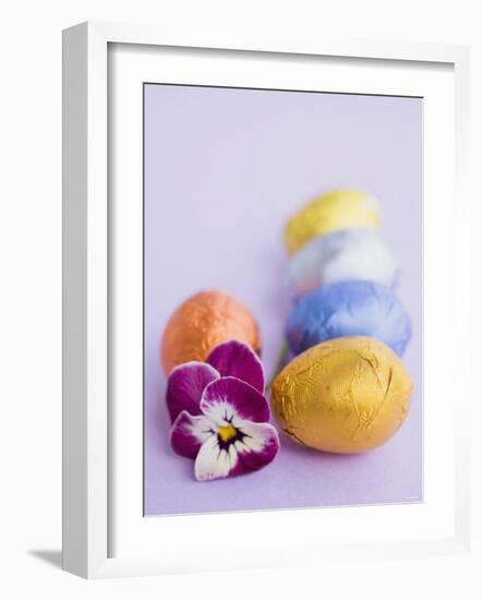 Chocolate Eggs in Foil, with Pansy-null-Framed Photographic Print