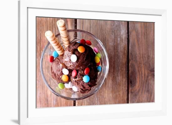 Chocolate Ice Cream with Multicolor Candies and Wafer Rolls in Glass Bowl, on Wooden Background-Yastremska-Framed Photographic Print