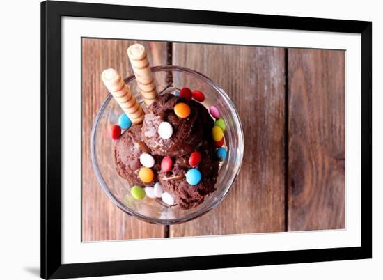 Chocolate Ice Cream with Multicolor Candies and Wafer Rolls in Glass Bowl, on Wooden Background-Yastremska-Framed Photographic Print