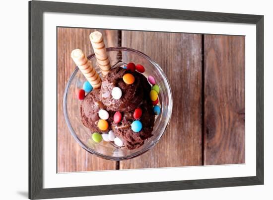 Chocolate Ice Cream with Multicolor Candies and Wafer Rolls in Glass Bowl, on Wooden Background-Yastremska-Framed Photographic Print