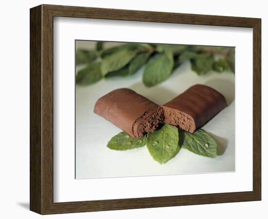 Chocolate Nutrition Bar on Mint Leaves-Chris Rogers-Framed Photographic Print