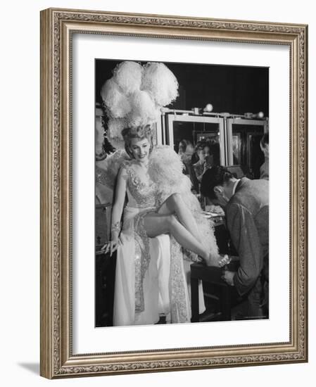 Chorus Girl Getting a Pedicure During Filming of the Movie "The Ziegfeld Follies"-John Florea-Framed Photographic Print