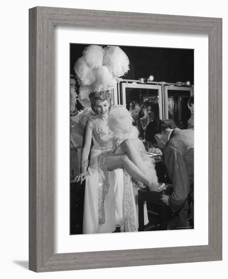 Chorus Girl Getting a Pedicure During Filming of the Movie "The Ziegfeld Follies"-John Florea-Framed Photographic Print
