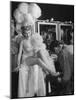 Chorus Girl Getting a Pedicure During Filming of the Movie "The Ziegfeld Follies"-John Florea-Mounted Photographic Print