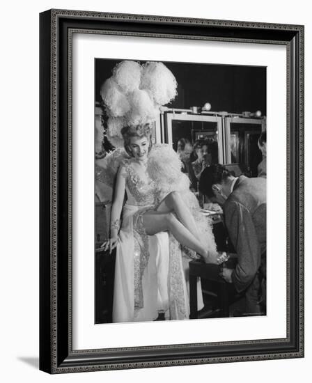 Chorus Girl Getting a Pedicure During Filming of the Movie "The Ziegfeld Follies"-John Florea-Framed Photographic Print