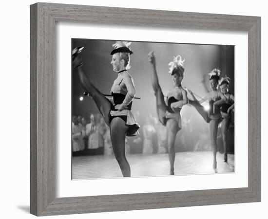 Chorus Girl High Kicking During a Performance at the Cannes Film Festival-Paul Schutzer-Framed Photographic Print