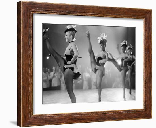 Chorus Girl High Kicking During a Performance at the Cannes Film Festival-Paul Schutzer-Framed Photographic Print