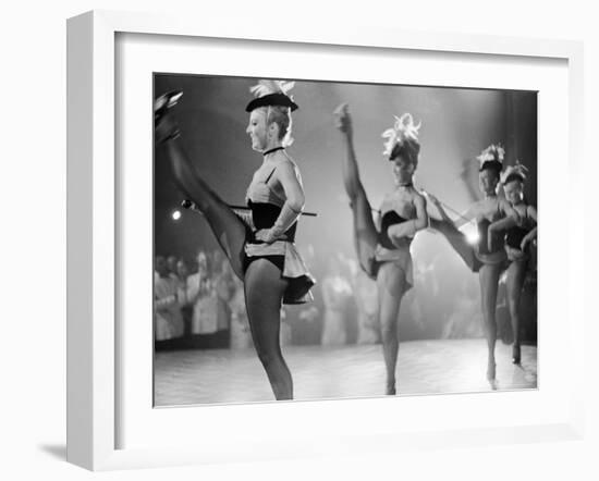 Chorus Girl High Kicking During a Performance at the Cannes Film Festival-Paul Schutzer-Framed Photographic Print