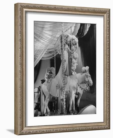 Chorus Girl Standing on Horse's Back During Filming of the Movie "The Ziegfeld Follies"-John Florea-Framed Photographic Print