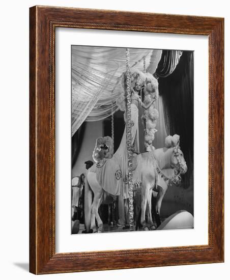 Chorus Girl Standing on Horse's Back During Filming of the Movie "The Ziegfeld Follies"-John Florea-Framed Photographic Print