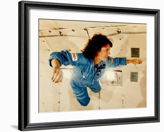 Christa McAuliffe Experiences Weightlessness-null-Framed Photo