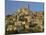 Christian Church on the Skyline and Houses in the Village of Eus, Languedoc Roussillon, France-Michael Busselle-Mounted Photographic Print