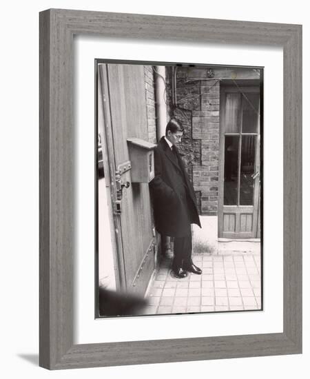Christian Dior's Successor Yves Saint Laurent Standing Alone After Attending Dior's Funeral-Loomis Dean-Framed Photographic Print