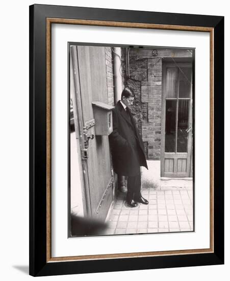 Christian Dior's Successor Yves Saint Laurent Standing Alone After Attending Dior's Funeral-Loomis Dean-Framed Photographic Print