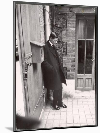 Christian Dior's Successor Yves Saint Laurent Standing Alone After Attending Dior's Funeral-Loomis Dean-Mounted Photographic Print