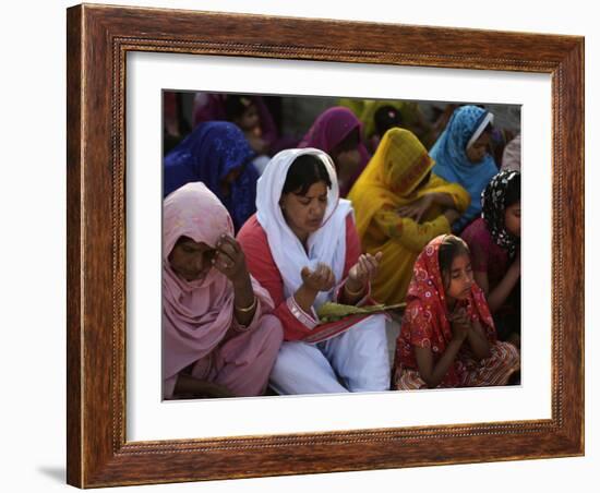 Christians Pray During a Ceremony to Celebrate Orthodox Palm Sunday, Outside a Church in Pakistan-null-Framed Photographic Print