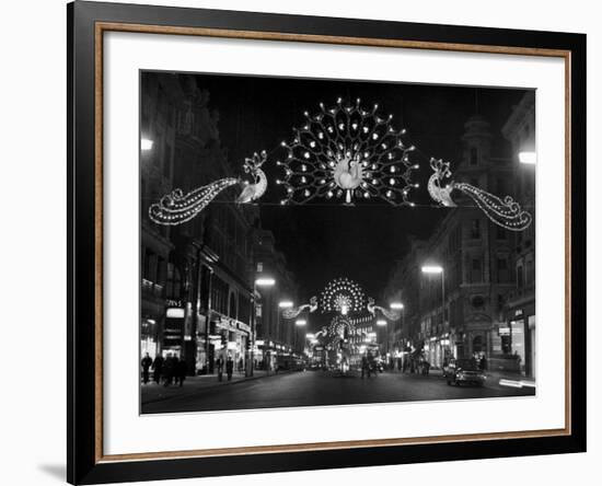 Christmas Decorations Hung across Regent Street in London-null-Framed Photographic Print