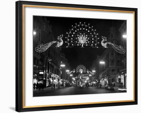 Christmas Decorations Hung across Regent Street in London-null-Framed Photographic Print