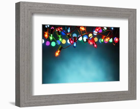 Christmas Lights over Dark Blue Background-Sofiaworld-Framed Photographic Print