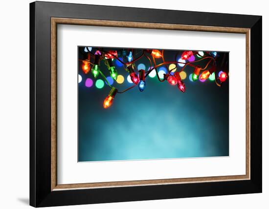 Christmas Lights over Dark Blue Background-Sofiaworld-Framed Photographic Print