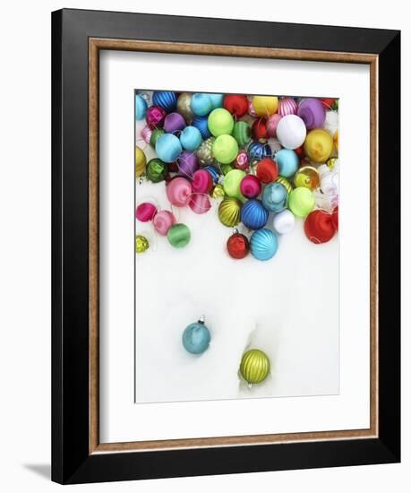 Christmas ornaments on snow-Pauline St. Denis-Framed Photographic Print