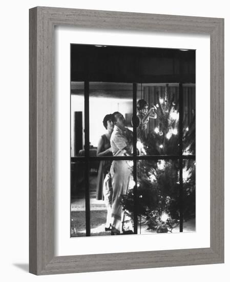 Christmas Tree Being Decorated by a Family Stationed at Guantanamo Naval Base-John Dominis-Framed Photographic Print