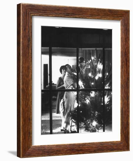 Christmas Tree Being Decorated by a Family Stationed at Guantanamo Naval Base-John Dominis-Framed Photographic Print