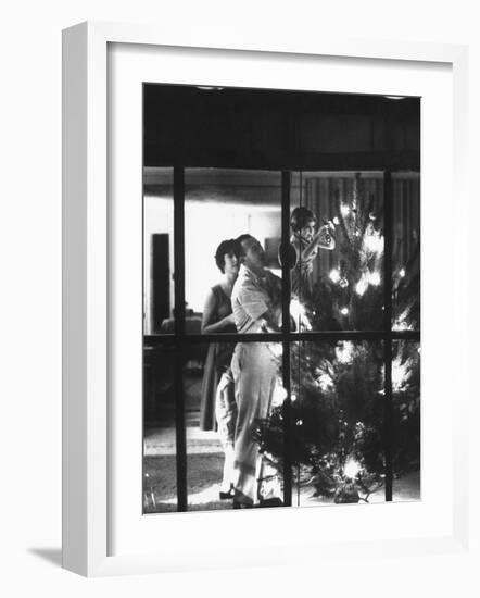 Christmas Tree Being Decorated by a Family Stationed at Guantanamo Naval Base-John Dominis-Framed Photographic Print