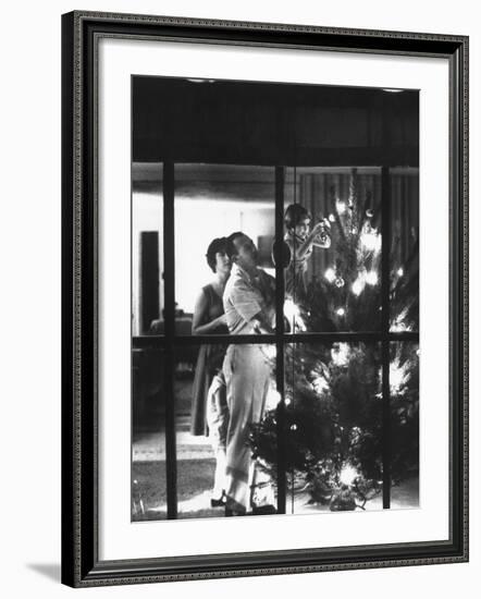 Christmas Tree Being Decorated by a Family Stationed at Guantanamo Naval Base-John Dominis-Framed Photographic Print
