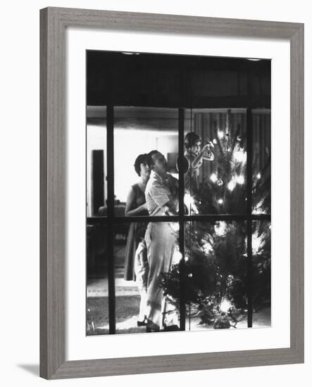 Christmas Tree Being Decorated by a Family Stationed at Guantanamo Naval Base-John Dominis-Framed Photographic Print