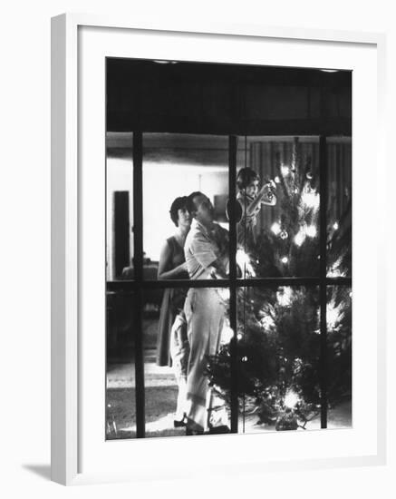 Christmas Tree Being Decorated by a Family Stationed at Guantanamo Naval Base-John Dominis-Framed Photographic Print