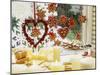 Christmassy Window Decorated with Biscuits and Candles-Linda Burgess-Mounted Photographic Print