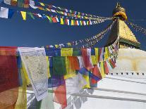 Prayer Flags Flutter from the Apex of Bodnath Stupa, Kathmandu, Nepal-Christopher Bettencourt-Photographic Print
