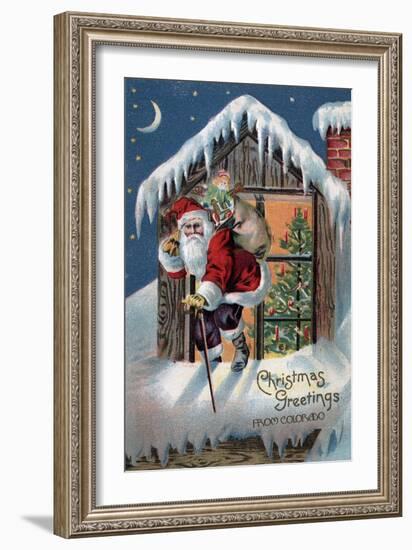 Chrsitmas Greetings from Colorado - Santa Climbing Out Window-Lantern Press-Framed Art Print