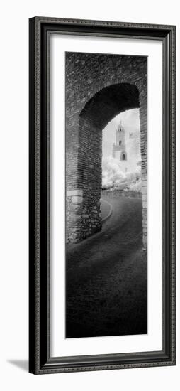 Church Viewed Through an Archway, Puerta Del Sol, Medina Sidonia, Cadiz, Andalusia, Spain-null-Framed Photographic Print