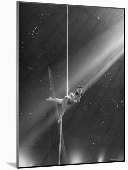 Circus Aerialist Bella Attardi, Hanging on Rope Practicing Aerial Ballet For Ringling Bros. Circus-Nina Leen-Mounted Photographic Print