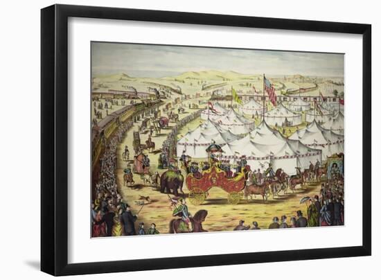 Circus parade around tents, with crowd watching alongside railroad train, circa 1874.-Stocktrek Images-Framed Art Print