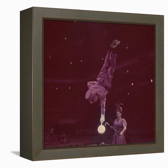 Circus Performer Balancing on Forefinger-Ralph Morse-Framed Premier Image Canvas