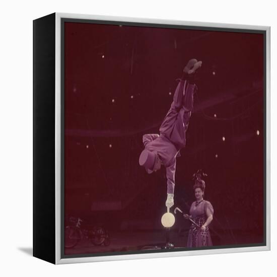 Circus Performer Balancing on Forefinger-Ralph Morse-Framed Premier Image Canvas