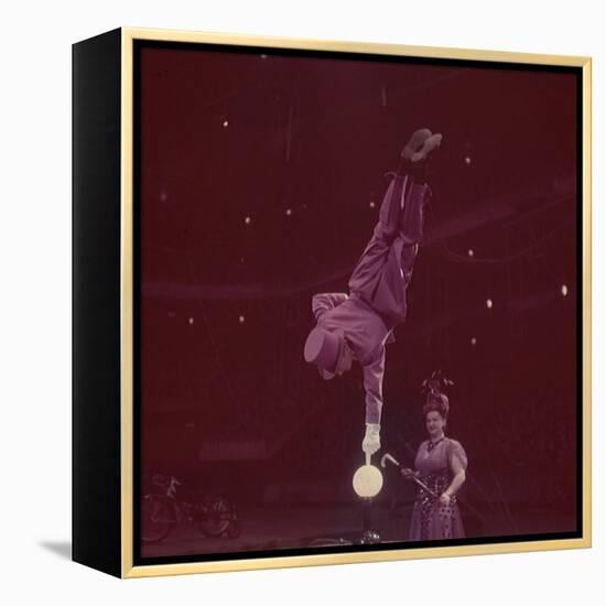 Circus Performer Balancing on Forefinger-Ralph Morse-Framed Premier Image Canvas